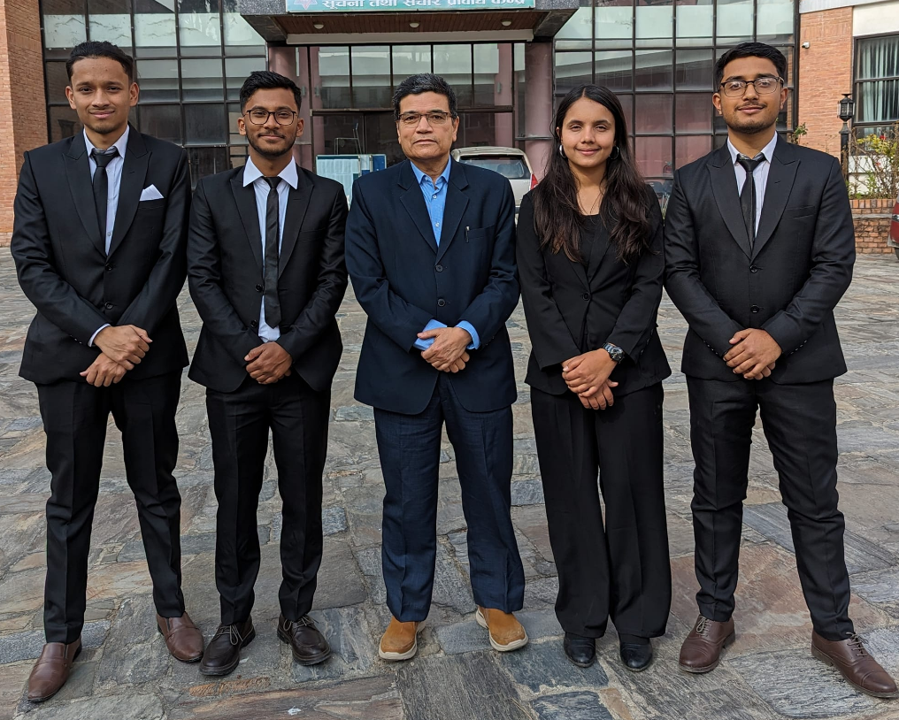 With project supervisor and team on thesis submission day